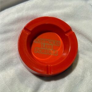 Assholes Live Forever Red Ashtray with Gold Letter